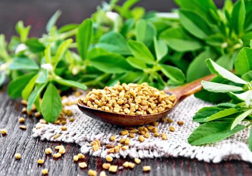 fenugreek-in-spoon-with-leaves-on-board.jpg